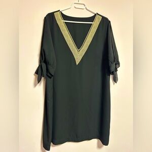 Elegant Black Dress with Gold Trim